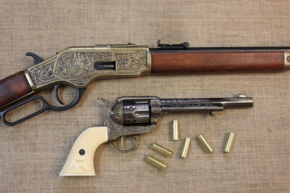 Winchester 1873 Carbine Replica, Engraved (Brass), with an engraved Peacemaker replica and dummy rounds