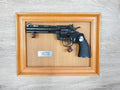 Framed .357 Combat Revolver Replica (Wall Display), in its timber display frame