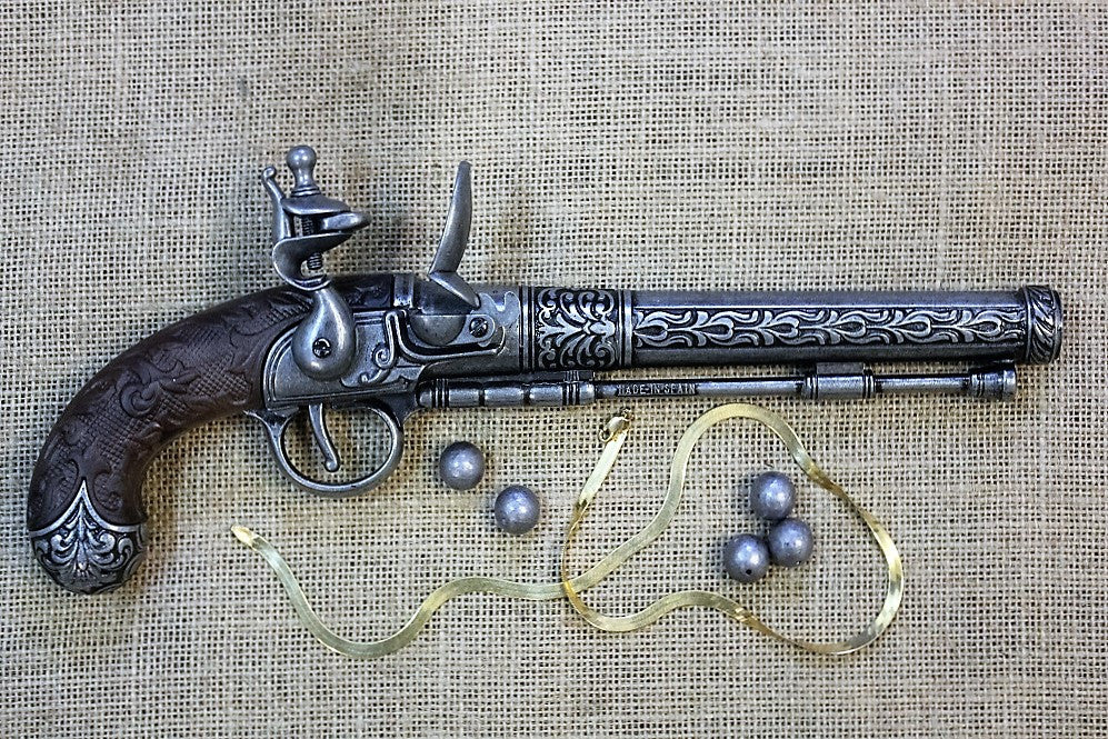 Liège Flintlock Pistol Replica, Late 18th Century, side view with lead balls and a brass ribbon