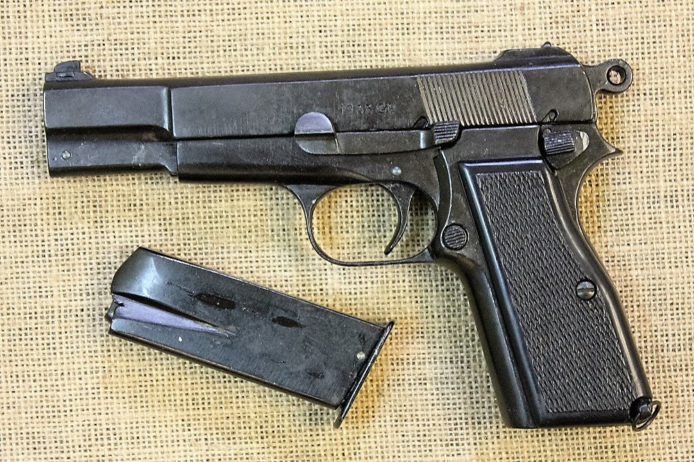 Browning Hi-Power 9mm Replica Pistol, right side with the magazine out