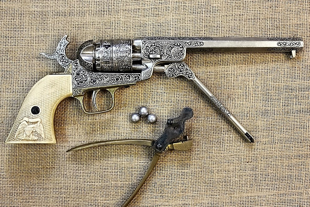 Engraved Colt 1851 Navy Replica Revolver (Ivory-Look Grips), with the loading lever down