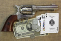 Colt Peacemaker .45 Quick Draw Replica Revolver (Chrome), right side with playing cards and banknotes