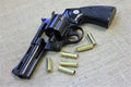 Colt Python .357 4in Replica Revolver, angled view with dummy rounds