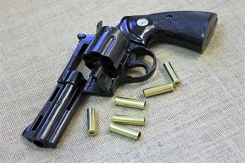 Colt Python .357 4in Replica Revolver, angled view with dummy rounds