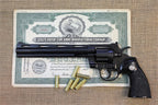 Colt Python .357 8in Replica Revolver, left side on a Colt share certificate