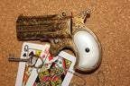 Double-Barrel Derringer 1866 Replica Pistol (Engraved Brass), left side with playing cards
