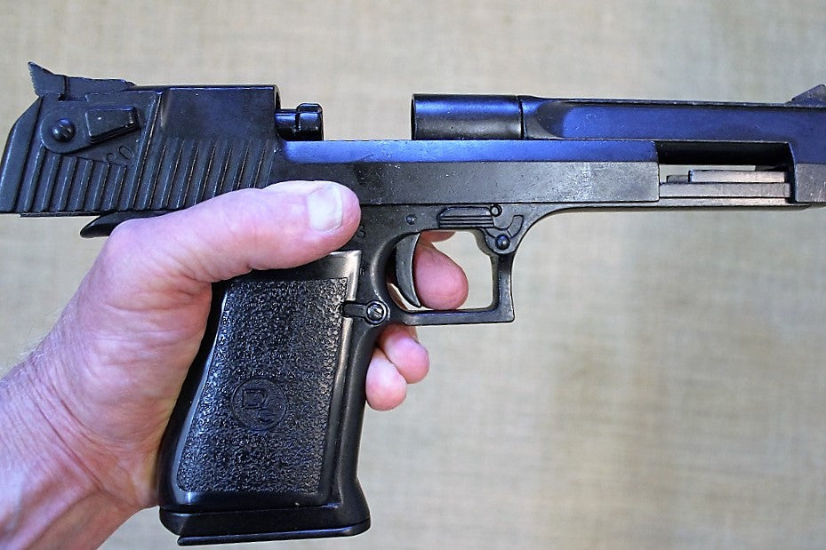 Desert Eagle .357 Replica Pistol, in the hand with the slide back
