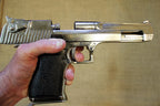 Desert Eagle .357 Replica Pistol (Chrome), in the hand with the slide back