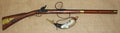 Kentucky Flintlock Rifle Replica, right side, full length with a powder horn