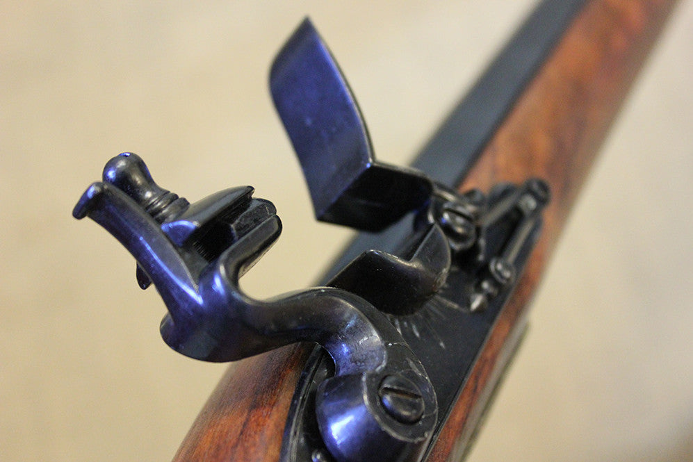 Kentucky Flintlock Rifle Replica, cock and open frizzen, close up