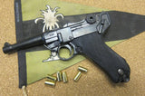 Luger P08 9mm Replica Pistol, left side with dummy rounds