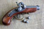 Baby Philadelphia Deringer Replica Pistol, USA 1850, side view with lead balls